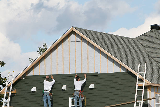 Professional Storm Damage Siding Repair technician working in Rosedale, MD